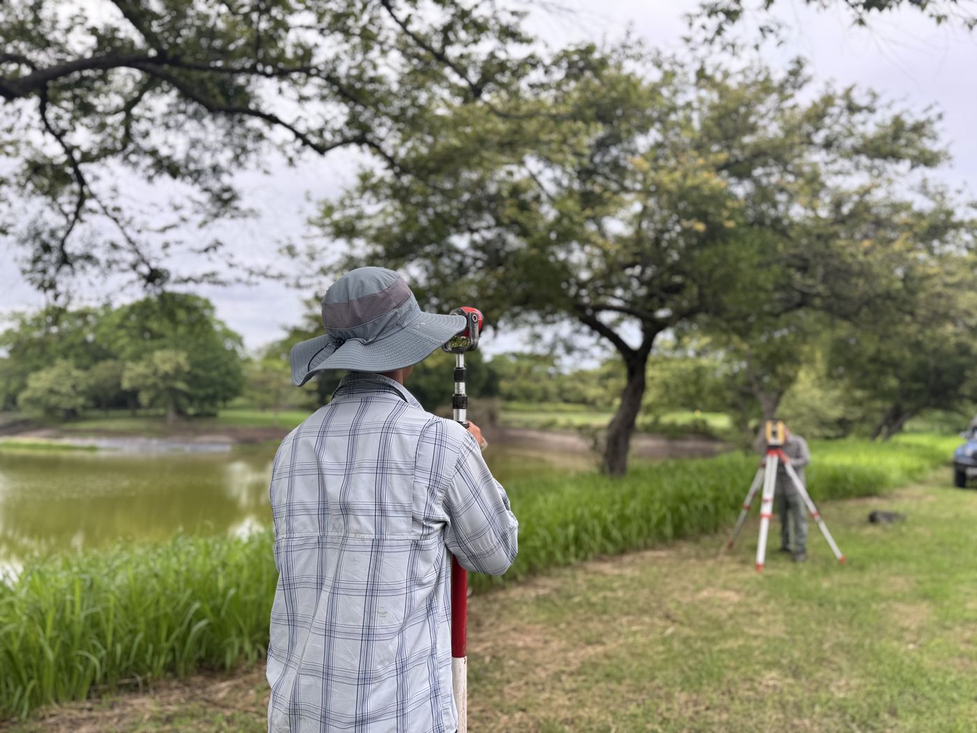 SurveyLifeCR surveyor working in the field in Guanacaste