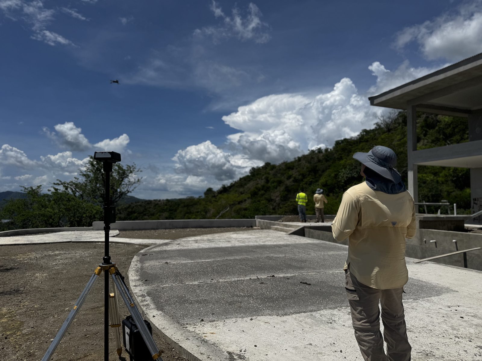 Surveyor collecting GNSS measurements on site