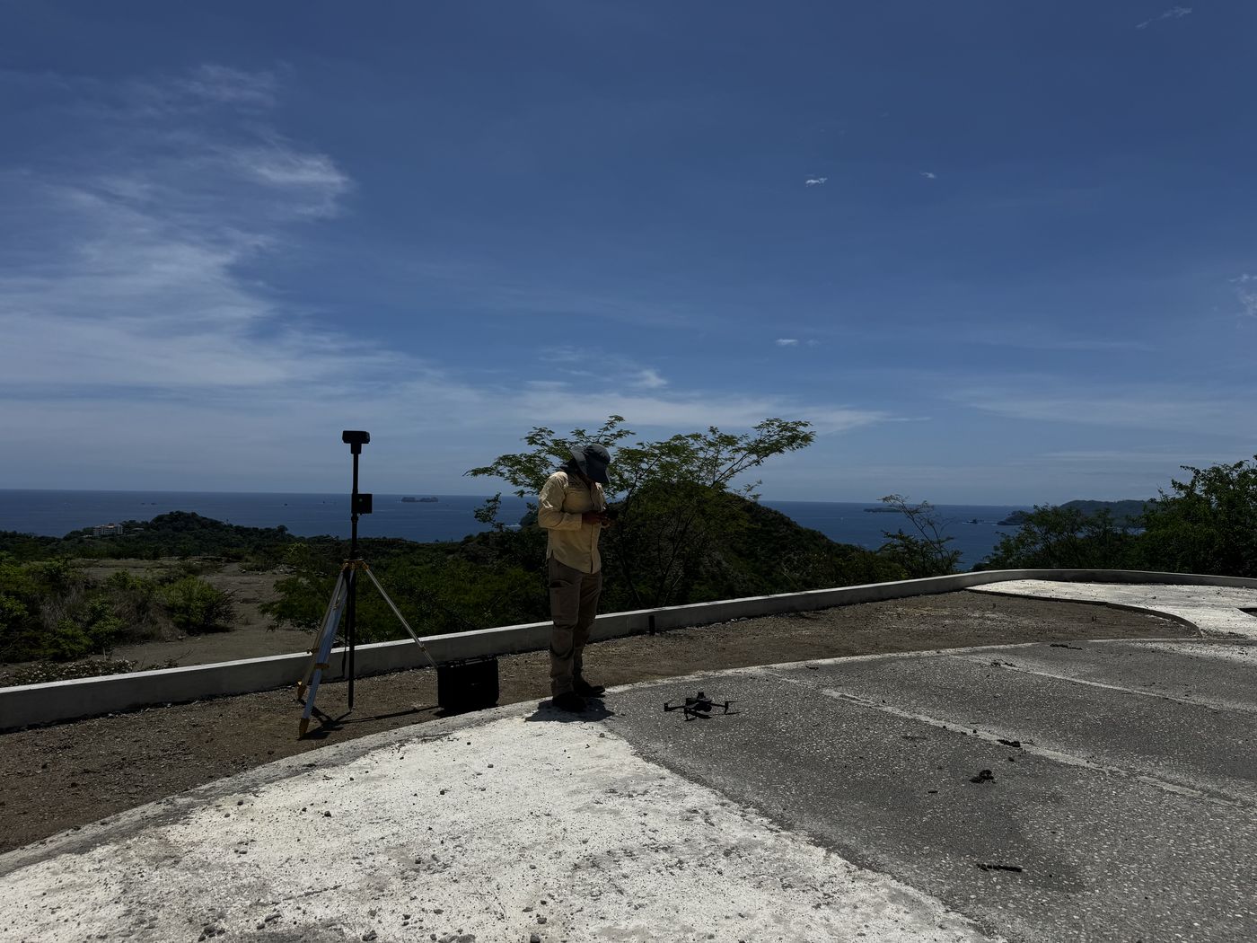 GNSS receiver on a tripod above the Guanacaste coastline